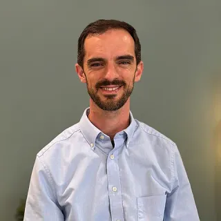 Portrait of John Kluge